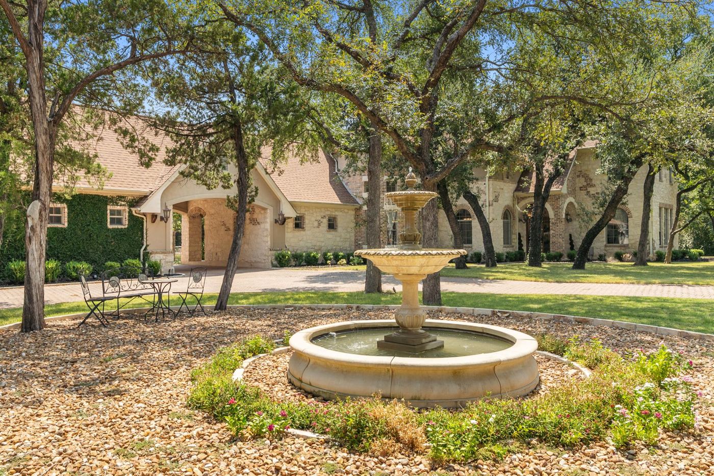 Stone fountain in the circular drive