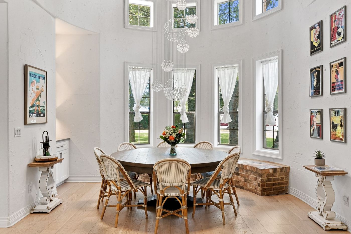 Round dining table under a crystal chandelier in the tower