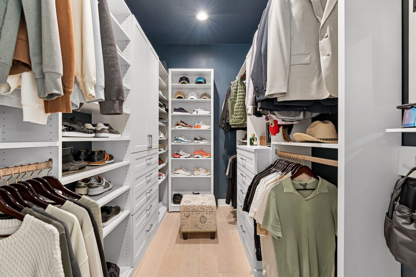 Walk-in closet with shoe wall