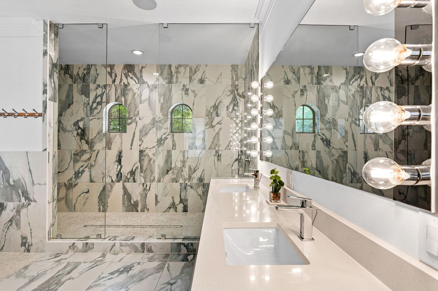 Primary bath with Hollywood vanity lights