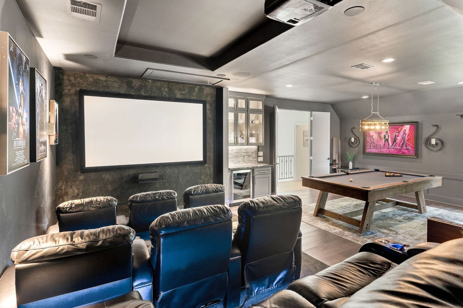 Home theater with leather recliners and projection screen